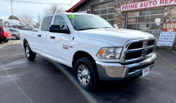 2017 Dodge Ram 2500 white with chrome accents, crew cab and long box.